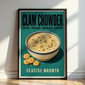 May include: A framed poster featuring a bowl of creamy clam chowder with visible potato chunks and herbs. The text reads CLAM CHOWDER, BOSTON, PORTLAND, PROVIDENCE, CAPE COD, and SEASIDE WARMTH. Four round crackers are placed beside the bowl on a teal background.