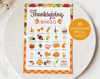 May include: Thanksgiving Bingo game card with colorful illustrations of fall-themed items like pumpkins, corn, and apples. The card features the text "Thanksgiving Bingo" and "Instant Download". Includes 30 bingo cards.