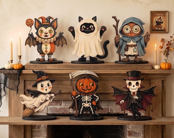 May include: Six decorative Halloween figures standing on a wooden mantel. The figures include a bat jester, a cat in a ghost costume, an owl wizard, a ghost on a broomstick, a skeleton with a pumpkin head holding a scythe, and a vampire.