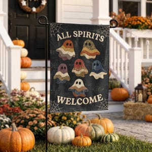 May include: A black Halloween garden flag with the words "ALL SPIRITS WELCOME" and images of patchwork ghosts. The flag is displayed outdoors with pumpkins and fall foliage.