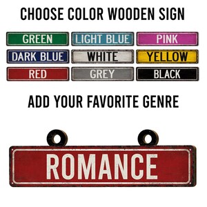May include: A wooden sign with the word "ROMANCE" in white letters on a red background. The sign has two black circular mounting holes. Above the sign are color options: green, light blue, pink, dark blue, white, yellow, red, grey, and black. The text "CHOOSE COLOR WOODEN SIGN" and "ADD YOUR FAVORITE GENRE" are also visible.