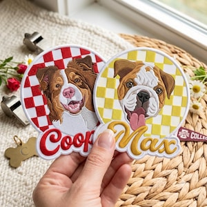 May include: Two circular embroidered patches featuring dog portraits. One patch shows a brown and white dog with a red and white checkered background and the name Coop in red. The other shows a bulldog with a yellow and white checkered background and the name Max in yellow.