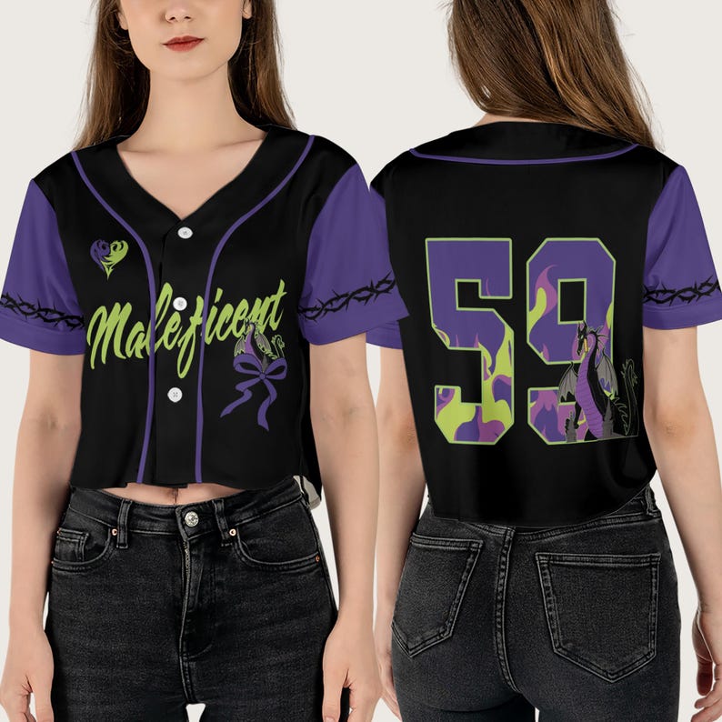 May include: A black baseball jersey with purple trim and a green and purple design. The front of the jersey has the word "Maleficent" in green letters with a purple heart and a purple bow. The back of the jersey has the number "59" in purple and green with a purple dragon.