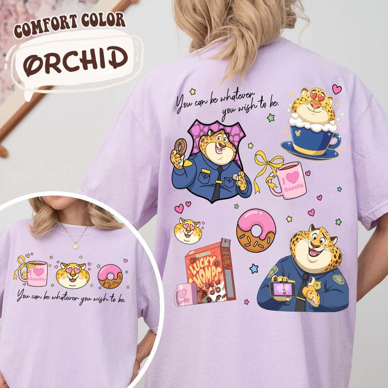 May include: Orchid-colored t-shirt with cartoon leopard illustrations. The shirt features a leopard in a police uniform, a donut, a coffee cup, and the text "You can be whatever you wish to be."