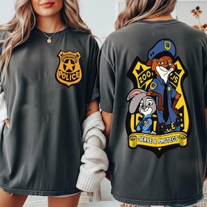 May include: Dark grey t-shirts with a Zootropolis Police badge on the front and a cartoon image of Nick Wilde and Judy Hopps on the back. The back graphic includes the text "Zootropolis Police" and "Serve & Protect".