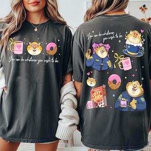 May include: Dark gray t-shirts with a cartoon design featuring a cheetah character, donuts, coffee, and the text "You can be whatever you wish to be." The design is repeated on the front and back.