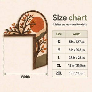 May include: An L-shaped wooden corner wall decor piece featuring a tree with orange, brown, and green leaves against a sunset background. A size chart displays widths ranging from 5 inches to 15 inches for sizes S through 2XL, indicating measurements.