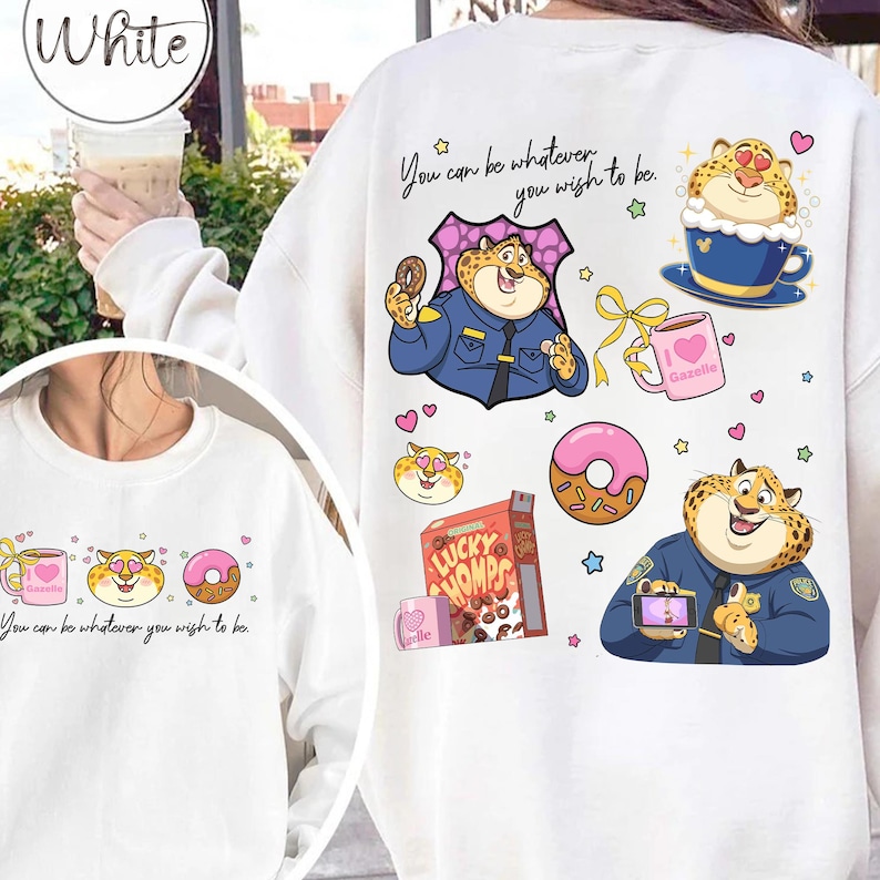 May include: White sweatshirt featuring cartoon illustrations of a cheetah character in various poses, including one in a police uniform and another with a coffee cup. The phrase "You can be whatever you wish to be" is also printed on the sweatshirt.
