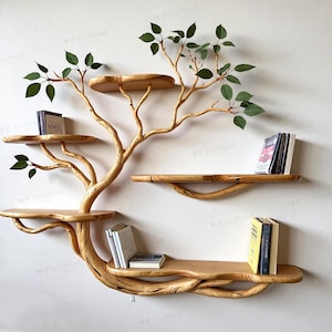 May include: A wooden tree-shaped bookshelf with multiple shelves of varying sizes. The shelves are made of light-colored wood and are adorned with books. Green leaves are attached to the branches, adding a natural touch to the design.