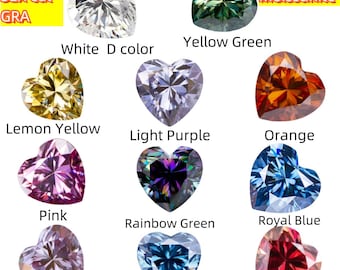 Könnte beinhalten: Eine Sammlung von herzförmigen Moissanit-Edelsteinen in verschiedenen Farben, darunter Weiß, Gelbgrün, Zitronengelb, Hellviolett, Orange, Rosa, Regenbogen-Grün, Königsblau, Sakura-Rosa, Saphirblau und Wassermelonenrot. Der Text "WS1 3EX cut GRA" und "Heart moissanite" ist im Bild sichtbar.