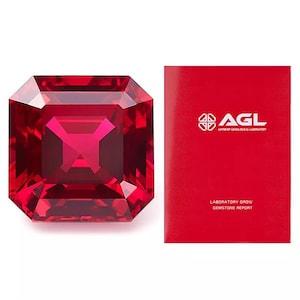 May include: A deep red, square-shaped gemstone with a certificate from the Antwerp Gemological Laboratory (AGL) stating it is a laboratory-grown gemstone.