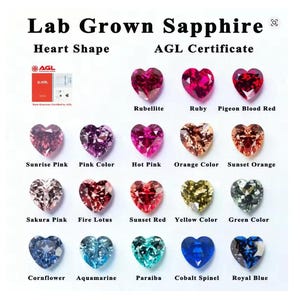May include: An array of heart-shaped lab-grown sapphires in shades of red, pink, orange, yellow, green, and blue. The image features the text "Lab Grown Sapphire" and "AGL Certificate".