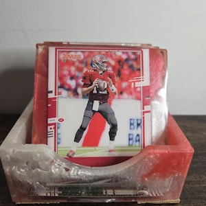 Unieke, op bestelling gemaakte sportkaartonderzetters: perfect voor fans!