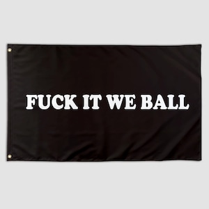 May include: Black rectangular flag with the white text "FUCK IT WE BALL". The flag has grommets in the corners for hanging. The text is in a bold, sans-serif font.