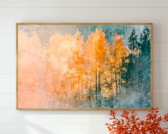 以下が含まれることがあります： 森の木々の風景を描いた長方形のウォールアートプリント。左側には鮮やかなオレンジと黄色の葉が広がり、右側に向かって深いティールとダークグリーンの木々へと変化しており、全体が柔らかく霞んだ背景の中に配置されています。