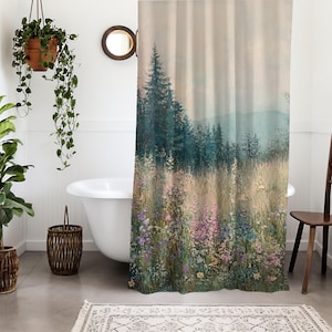 May include: A shower curtain with a nature scene featuring a forest with tall trees and a field of wildflowers in shades of pink, purple, and yellow. The background is a soft, hazy blue.
