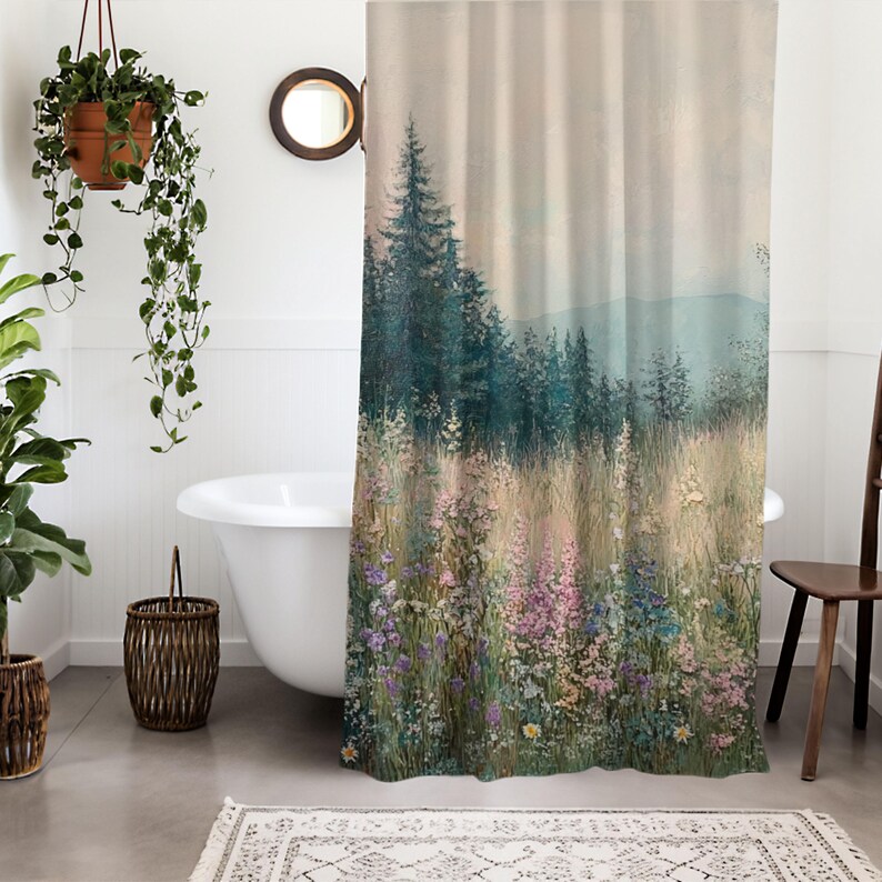 May include: A shower curtain with a nature scene featuring a forest with tall trees and a field of wildflowers in shades of pink, purple, and yellow. The background is a soft, hazy blue.