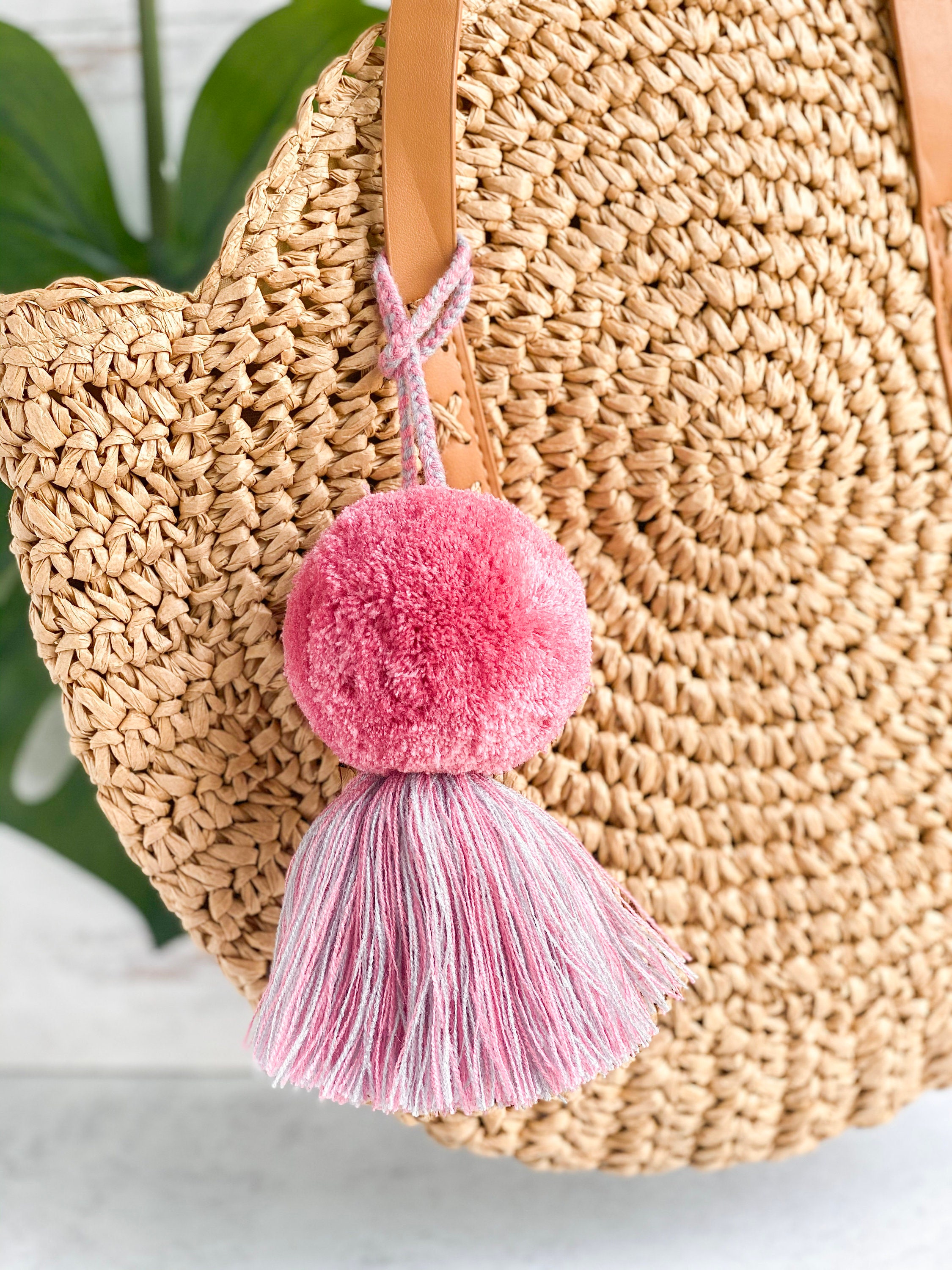 Makeover Your Plain Wicker Beach Tote With a Skien of Pompom Yarn