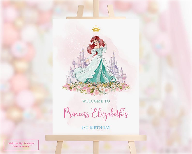 May include: A white ceramic mug with a black handle and the text "But First, Coffee" in a handwritten style. The mug is on a white surface. The mug is approximately 10 cm tall.