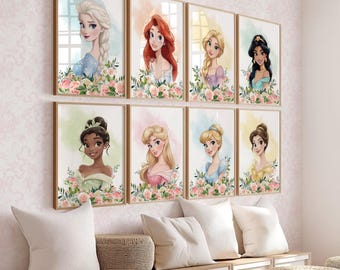 May include: Eight framed watercolor portraits of Disney princesses, each with floral accents. The portraits feature Elsa, Ariel, Belle, Jasmine, Tiana, Aurora, Cinderella, and Rapunzel. The artwork is displayed on a pink patterned wall.