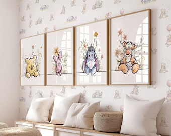 May include: Four framed prints featuring Winnie the Pooh characters: Winnie the Pooh, Piglet, Eeyore, and Tigger. Each print has a light background with floral accents and a wooden frame. The wall behind the prints has a repeating pattern of Winnie the Pooh characters.