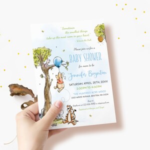 May include: A baby shower invitation featuring a watercolor illustration of Winnie the Pooh characters. The invitation includes the text "Baby Shower for mom to be Jennifer Boynton" and event details. The design has a whimsical, storybook theme.