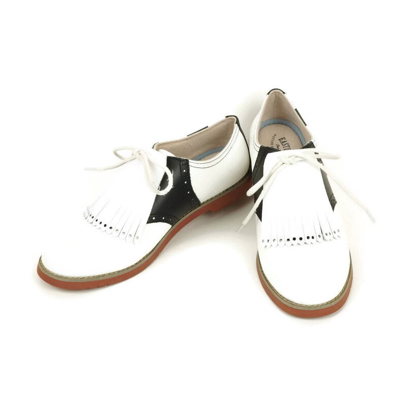 golf shoes saddle