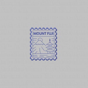 May include: A blue embroidered patch featuring Mount Fuji and a pagoda, with the text "MOUNT FUJI" at the top. The patch has a postage stamp design with a scalloped border, set against a gray background.