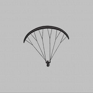 May include: A black paraglider with a single person hanging from it.