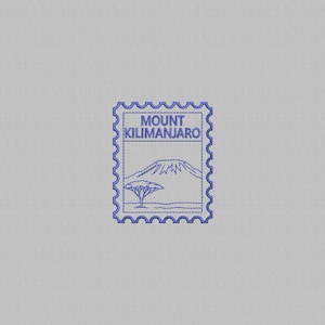 May include: A rectangular postage stamp design featuring a blue embroidered outline of Mount Kilimanjaro and a single acacia tree. The text MOUNT KILIMANJARO is stitched in blue thread at the top of the stamp, which has a classic scalloped edge.