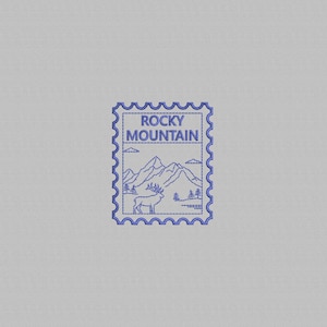 May include: A blue postage stamp design featuring the words "Rocky Mountain" above a mountain range, a deer, and trees. The stamp has a dotted border and is set against a light gray background.