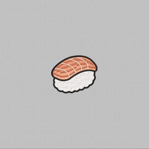 May include: Embroidered patch of a sushi nigiri. The salmon-colored fish is atop a bed of white rice, outlined in black. The patch is on a gray background.