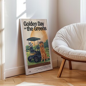 May include: A poster with a golden retriever dog in a golf cart on a green golf course. The poster has the text "Golden Day on the Greens" at the top. The poster is framed and hanging on a wall.