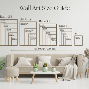 May include: A wall art size guide with different ratios and measurements in inches and centimeters. The guide shows the size of artwork that would look good above a 90-inch sofa.