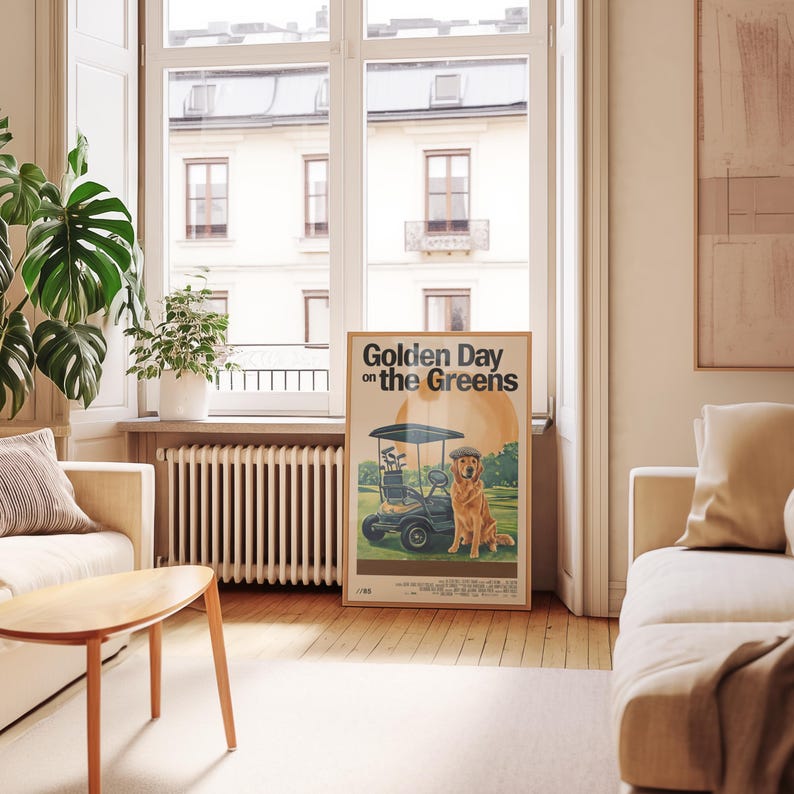 May include: A vintage poster with the text "Golden Day on the Greens" featuring a golden retriever dog sitting in a golf cart on a green golf course.