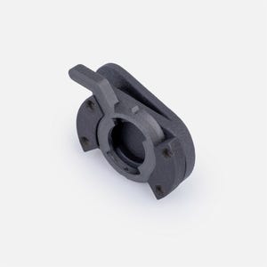May include: A matte black 3D printed mounting bracket featuring a circular central opening, a protruding lever arm on the upper left side, and three small screw holes positioned around the perimeter of the circular base for secure attachment.