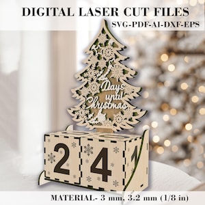 May include: A wooden Christmas countdown calendar with a laser-cut tree design. The calendar features a number display with the numbers 2 and 4 visible. The tree has the text "Days until Christmas" on it. The calendar is made from 3 mm or 3.2 mm (1/8 inch) thick wood.