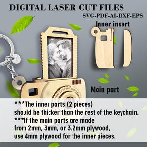 May include: A wooden camera keychain with a photo insert. The keychain is made of laser-cut plywood and comes in two parts: a main part and an inner insert. The inner insert is designed to be thicker than the main part. The text on the image reads "ERA. LOVE IN FOCUS LENS".