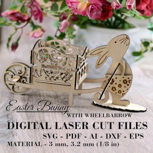 May include: A wooden Easter bunny holding a wheelbarrow with a floral design. The bunny is standing on a wooden base. The wheelbarrow is made of wood and has a floral design. The text "Easter Bunny with Wheelbarrow" is printed below the image. The text "Digital Laser Cut Files" is printed below the text "Easter Bunny with Wheelbarrow". The text "SVG - PDF - AI - DXF - EPS" is printed below the text "Digital Laser Cut Files". The text "Material - 3 mm, 3.2 mm (1/8 in)" is printed below the text "SVG - PDF - AI - DXF - EPS".