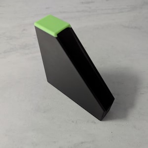 One Black and Glow in the Dark Coaster Holder