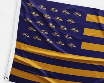 May include: An American flag with a blue field and 13 alternating red and white stripes. The blue field has 36 white raven logos arranged in a grid pattern.