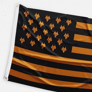 May include: A black and orange flag with a design resembling the American flag. The flag has orange stripes and a field of orange wolf heads.