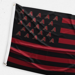 May include: An American flag with red and black stripes. The stars are replaced with the Arizona Diamondbacks logo.