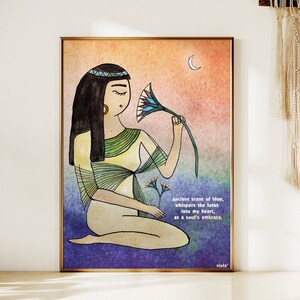 May include: A digital illustration of a woman with long black hair wearing a yellow and green dress, holding a blue and purple lotus flower. The background is a watercolor wash of pink, orange, and blue. The text "Ancient scent of blue, whispers the lotus into my heart, as a soul's embrace." is written in black at the bottom right corner of the image. The artist's signature "viola" is written in black at the bottom right corner of the image.