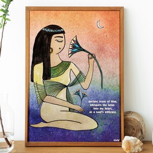 May include: A watercolor illustration of a woman with long dark hair wearing a yellow and green dress, sitting and smelling a blue and green lotus flower. The background is a gradient of orange, pink, purple, and blue. The text "Ancient scent of blue, whispers the lotus into my heart, as a soul's embrace. viola'" is at the bottom of the image.