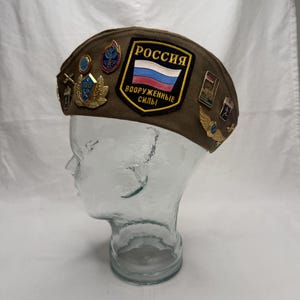 Vintage Russian military pilotka hat. Covered in souvenir pins. Khaki/army green color. Militaria. USSR. Size 58.