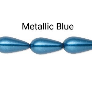 May include: Close-up of a strand of metallic blue teardrop-shaped beads. The beads are strung together, showcasing a glossy finish. The text "Metallic Blue" is displayed above the beads.
