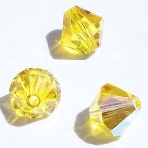 Preciosa Czech bicone crystal beads faceted Citrine yellow AB -- available in 3mm, 4mm, 5mm and 6mm