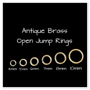 May include: Antique brass open jump rings in six sizes: 4mm, 5mm, 6mm, 7mm, 8mm, and 10mm.