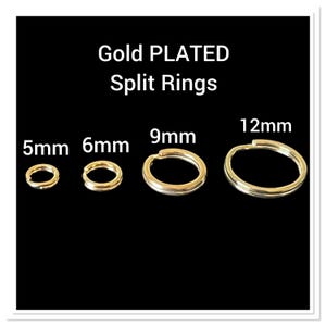 May include: Gold plated split rings in various sizes: 5mm, 6mm, 9mm, and 12mm. The rings are gold in color and are displayed against a black background. The text "Gold PLATED Split Rings" is at the top.